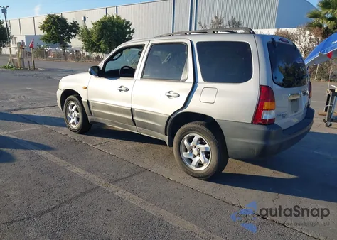 2002 Mazda Tribute Dx z USA, uszkodzony, nr VIN 4F2YU06B42KM34378